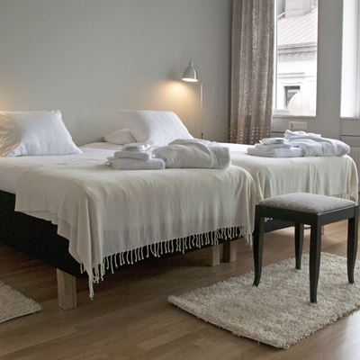 Hur ett rum på Le Mat B&B kan se ut med sköna sängar och krispiga släta lakan.